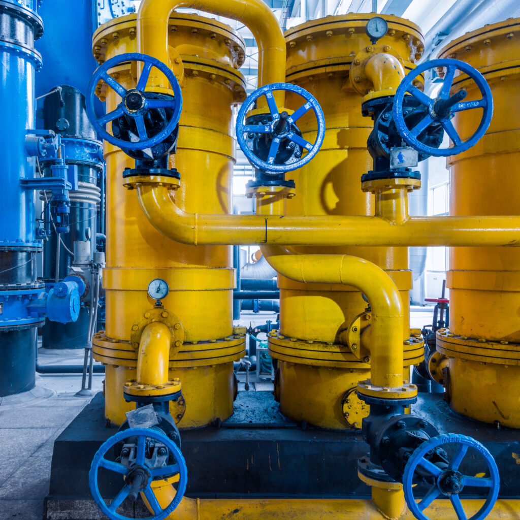 steel pipelines and cables in a plant